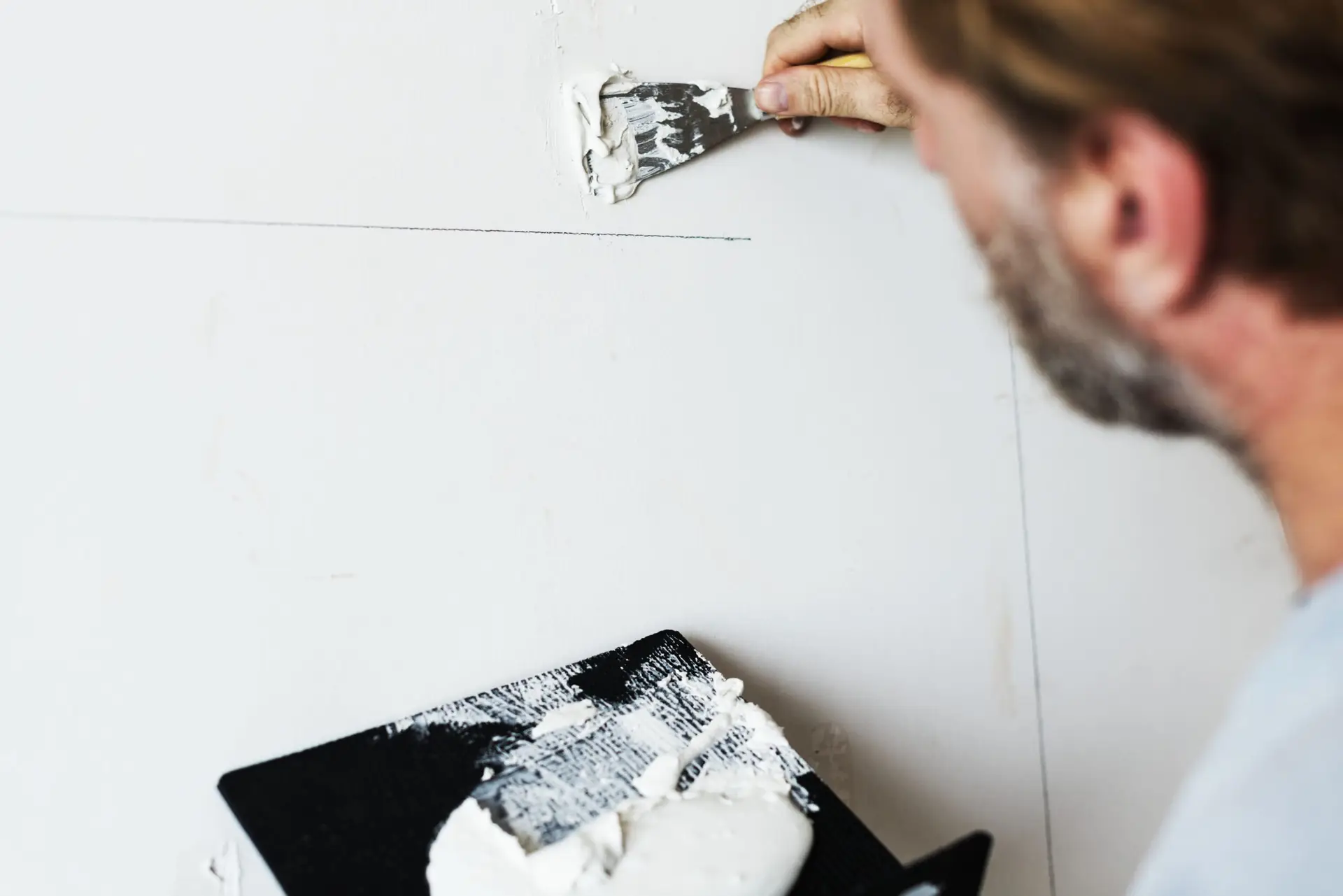 How to Fix Drywall Cracks Before Painting